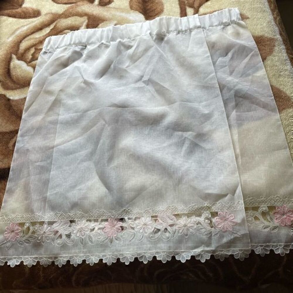 White floral window drape
